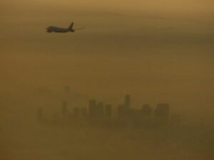 Smog continues as the principal threat to air quality. The Los Angeles Skyline approaching LAX
