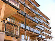 What is the current trend in green building upgrades to multi-family buildings?