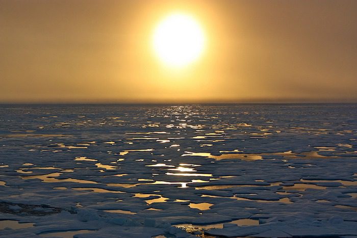 A melting ocean and Arctic sunset
