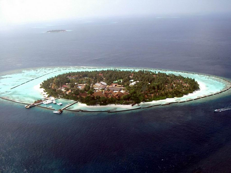 An island in the Maldives slowly succumbs to a rising sea