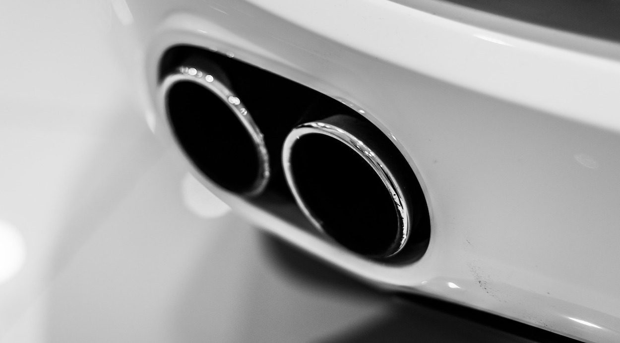 Dual tailpipes on a car meeting stringent vehicle emissions standards