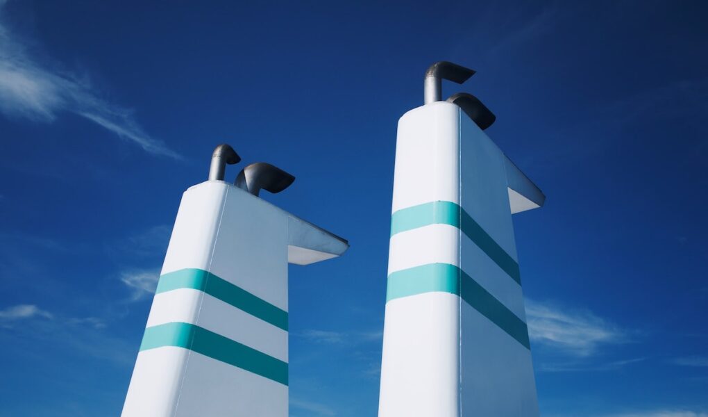 A close-up image of cruise ship exhaust stacks