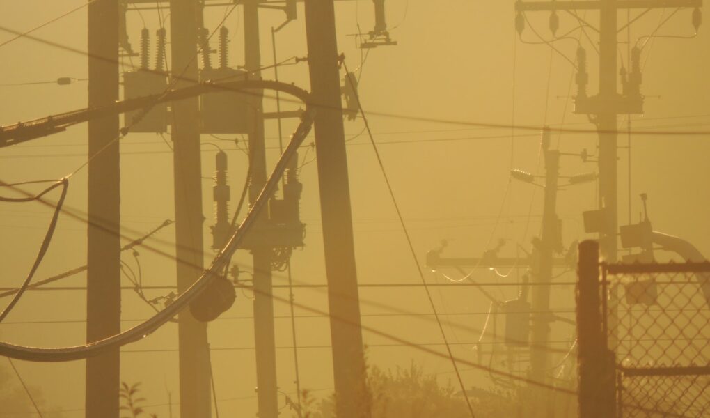 A power generating substation framed on a hazy day